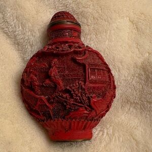 Chinese Carved Red Lacquer Snuff Bottle with Scenic Relief